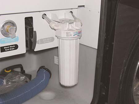 Full-Coach Water Filter System (Located in water service center) -Typical View Purge a new filter cartridge before using for drinking.