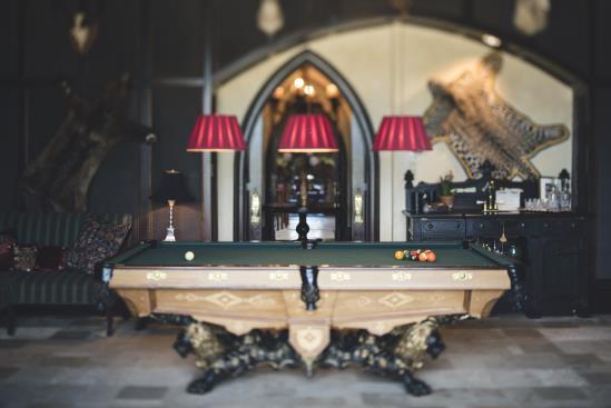 B I LLIARD RO O M Reflecting a trophy room from the era of Teddy Roosevelt, the Billiard Room provides all the ingredients of bygone days & safari hunt adventure.