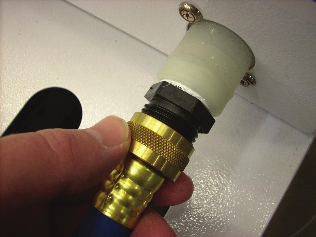 Run other end of drain hose to the drain. Do not allow any loops in the hose. Verify proper length before cutting.