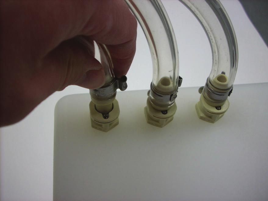 Connect the three straight fitting ends of the reservoir tubing set (78399-171) to