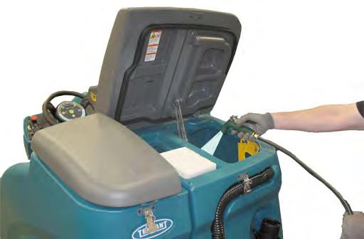 Clean the outside of the tank with vinyl cleaner. 1. Drive the machine near a floor drain.