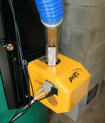 Reconnect the pellet feed hose from the pellet feed tube / flame trap pipe.