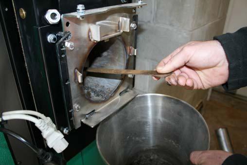 Ash from the Combustion Chamber Tube. Check that the air holes in the combustion chamber tube are free from residuals.