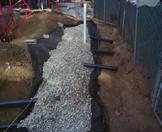 Direct harvest of precipitation and storage in a sub-surface 5,000 gallon cistern.