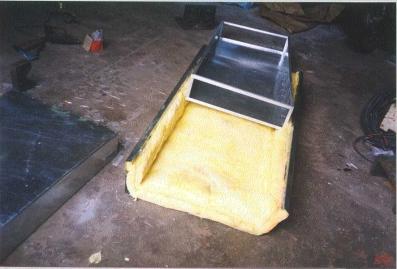 Figure 6: Insulation with fibreglass wool The dryer box is placed on a