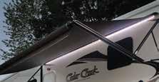 This back-up camera system utilizes wireless digital technology for a clearer rear view and enhanced safety. A&E metal wrapped awning with LED night light strip.