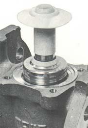 Insert the standard plug with the ports in the open position. The top of the plug should drop within approximately 1/4 inch of the body counterbore.