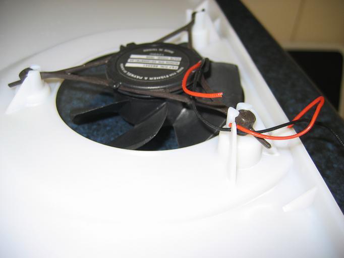 Once the fan socket and temp sensor have been removed, the rear panel assembly can be removed from the freezer and put on a bench.