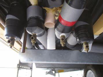 The above photo shows the plumbing under a home directly under a combination boiler.