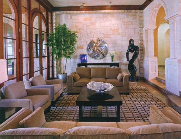 After deciding that the formal living room s sculptures would benefit from a textured backdrop, Johnson treated one wall with an applied rock texture, creating the illusion that the home s exterior