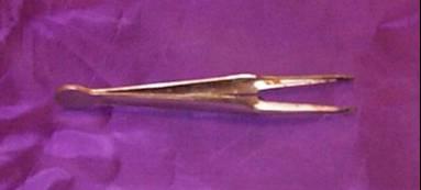 Forceps (or tweezers) are used