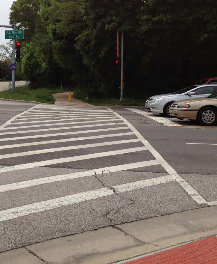 Intersection treatments like curb extensions, textures, pavement markings, crosswalks, eliminating free-flow right turn lanes, tightening corner curb radii, and installing pedestrian refuge islands