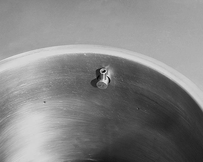Remove O-Ring from underside of kettle lid by prying it loose at one point with a plastic knife (Fig. 18) or other blunt, thin tool. Avoid slicing or gouging the O-Ring.