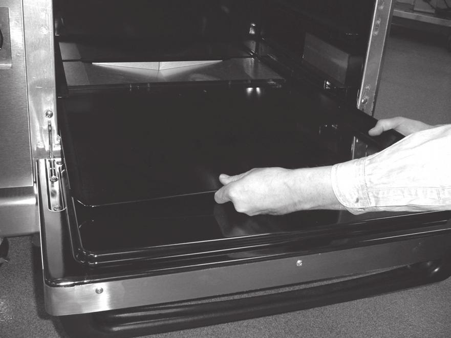 Standard oven racks, right, left and bottom oven liners are easily removed for cleaning. 1. After the oven has cooled, open the oven door and remove the oven rack (Fig. 19). 2.