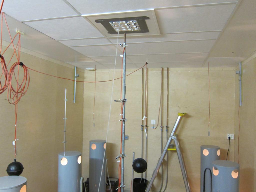 The multi-nozzle supply air diffuser was installed in the middle of the ceiling so that the supply air jet was flushing the radiant panels.