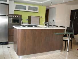 The colors of the cabinets and the counter top were brown and white.