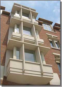 North Residential Village American Artstone Design Excellence Commercial What is the role of Cast Stone? To give life to brick buildings.