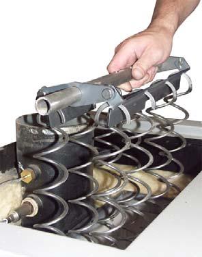 turbulators at the heat exchanger pipes as shown above Fröling