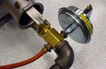 CAUTION: DO NOT bottom out the gas valve regulator adjusting screw. This can result in unregulated manifold pressure causing excess overfire and heat exchanger failure.