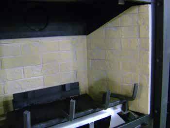 Verify that right refractory panel is slid all the way back by looking to see that it is flush with the firebox lip. Figure 2 Step 2.