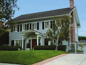 Common exterior character defining features include: Wood windows Wood siding Columns and pediments Wood doors (including sidelights)