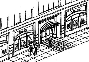 The building entrance is also highlighted by a unique awning element.