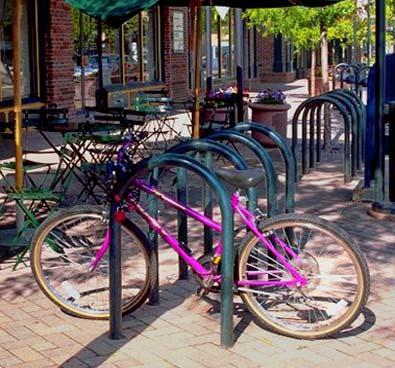 Guideline: Bicycle parking should be located in safe and convenient locations adjacent to the building to which it is associated for