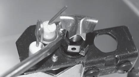 Use the fl athead screwdriver to push the pilot orifi ce lever (located at base of pilot head) completely to the opposite side (see Fig. 6-4).