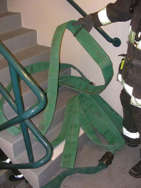 APPENDIX B 2½ INCH HOSELINE PROCEDURES FOR HIGH RISE Firefighter #4 Picks up the lead hose pack with shut off and