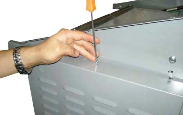 Remove screws from top of unit holding the rear and side panels in place (Figure 7-5).