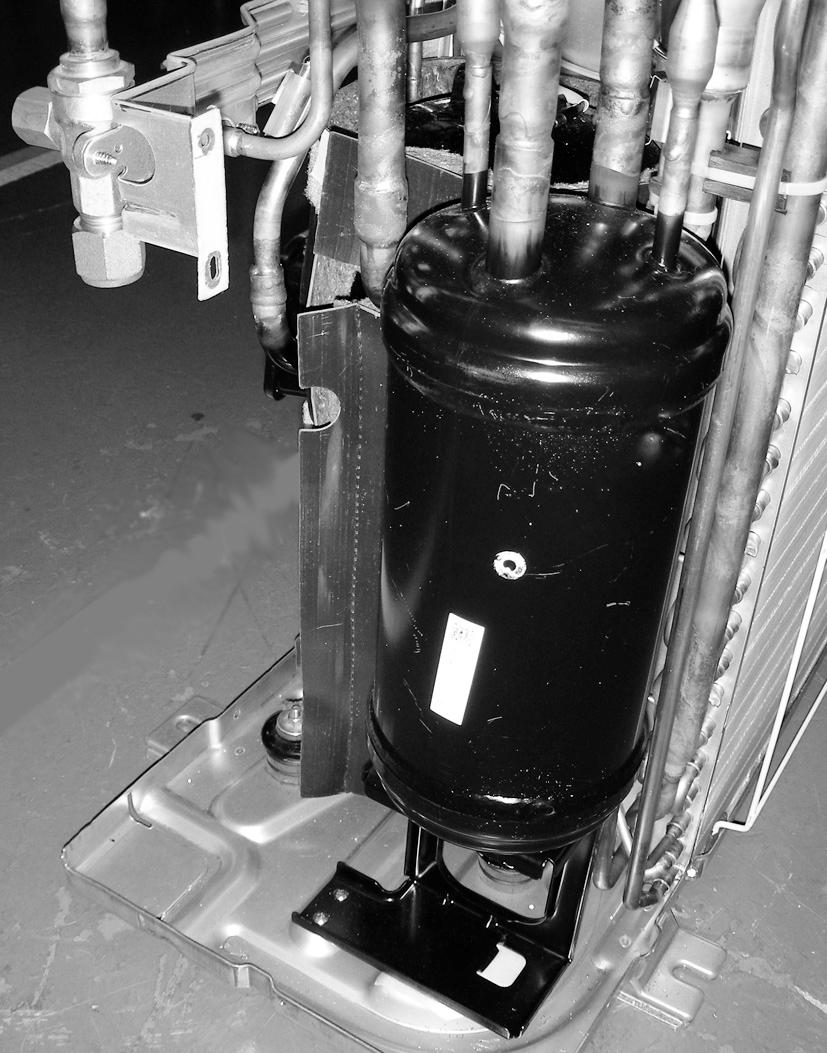 OPERATING PROCEDURE PHOTOS 3. Removing the compressor (MC) Photo 3 () Remove the service panel. (See Photo ) () Remove the top panel.