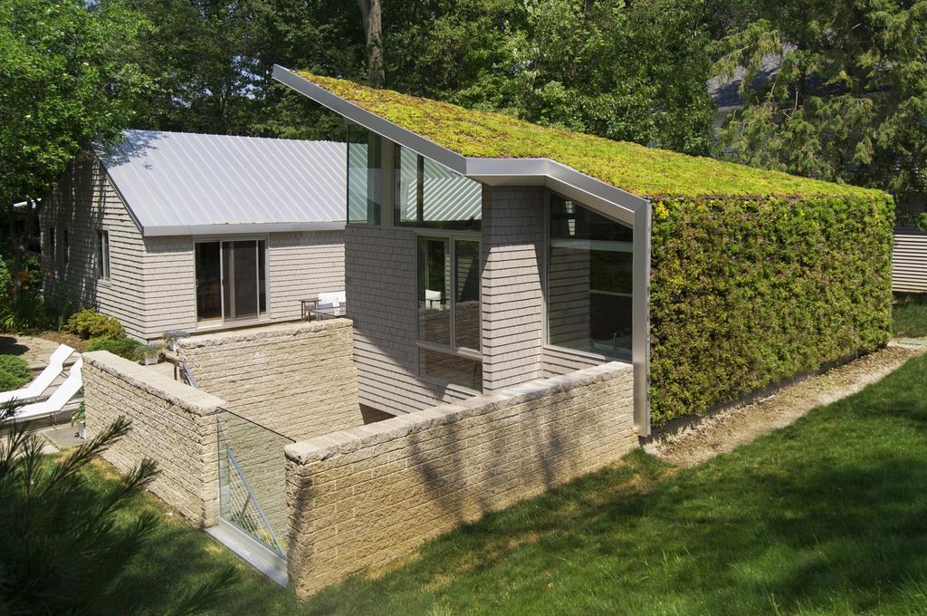 Many architects have adopted green roof design techniques to yield beautiful, sustainable residential homes.
