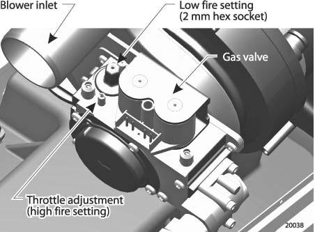 You will need to remove the boiler jacket top and adjust the gas valve low-fire setting as described below.