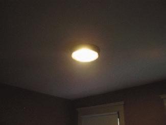 Lighting Fixtures: A single fluorescent light is currently installed in the center of the ceiling of each room.