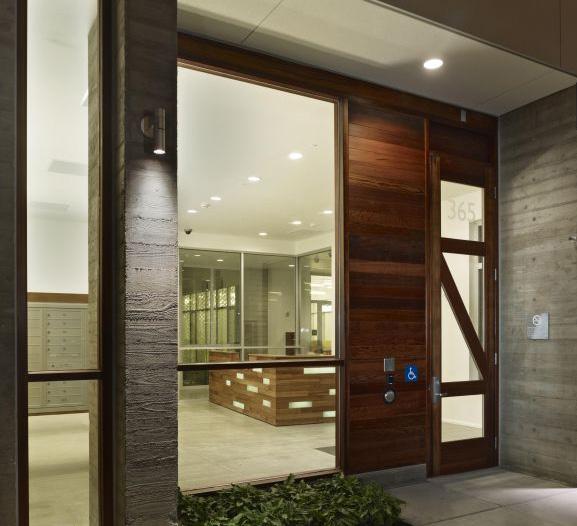 MULTIPLE UNIT BUILDING DESIGN Accessible apartment entry with integrated lighting and weather protection, Source: David Baker Architects.