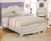 Glamorous youth group in a silver pearl finish Case pieces have faux gator 3D Press material for soft durable edges Tufted curvaceous upholstered bed has faux crystal buttons Drawer handles include