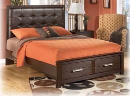 Queen Panel Bed (54/57/96) B165 Aleydis Clean, modern look with large scale pieces in warm brown finish Wide moldings frame the case pieces, beds, and mirrors Sculpted large handles are in a satin