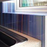 Printed blue multi stripe glass splashback