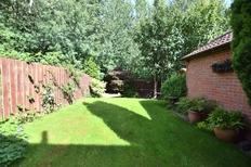 opening to a beautifully lawned garden with patio decked area, plus a lovely lounge.