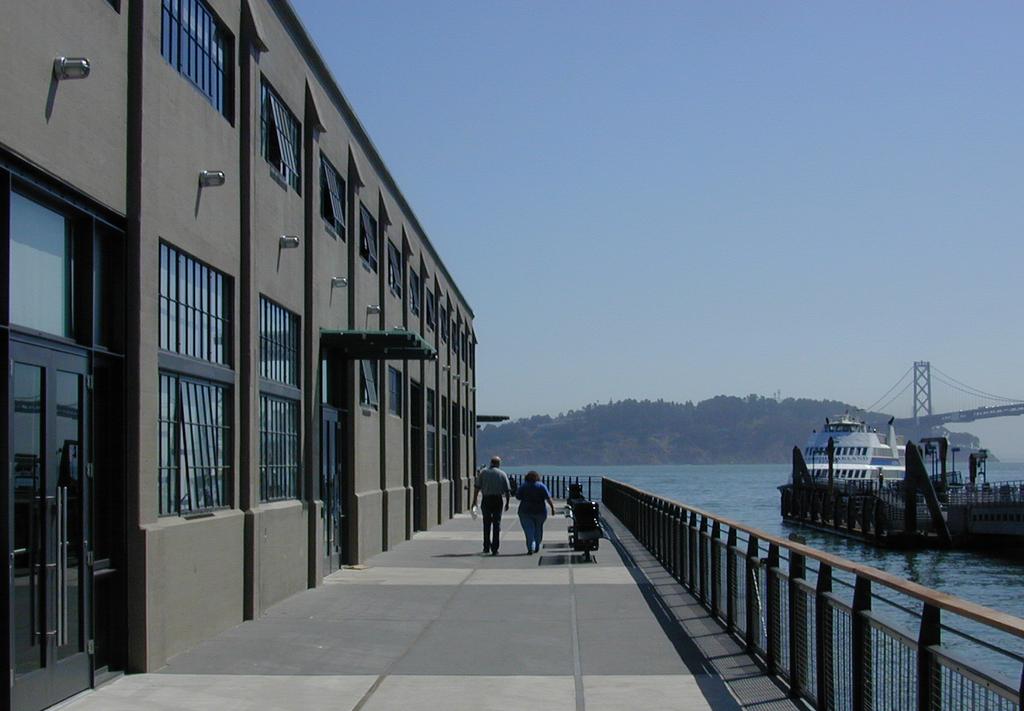 Lighting the pier aprons for use as open space should emphasize the length of the piers with a rhythm of doors, windows, perimeter lighting, and other edge improvements.