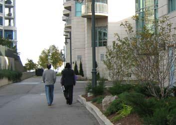 Within existing developed areas sidewalks are, at times, non-continuous and pedestrians are forced to cross the street to maintain their path of travel.