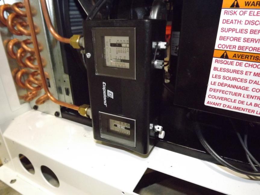 Instructions to Reset High Pressure Switch 1. Remove the top and side access panels at the condensing unit 2.
