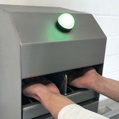 The industrial sole cleaning system Neptun HCS1 equipped with firmly integrated hand cleaning/hand disinfection prevents introduction of dirt and germs and in this way ensures compliance with