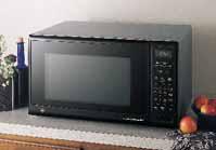 oven cavity 700 watts* Optional undercabinet mounting kit available JE740GY Black with greystone case (not shown) *IEC-705 Test Procedure **Optional Trim Kit Custom Trim kits
