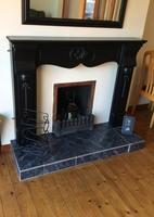915588767732343 Fireplace Grey tile hearth and