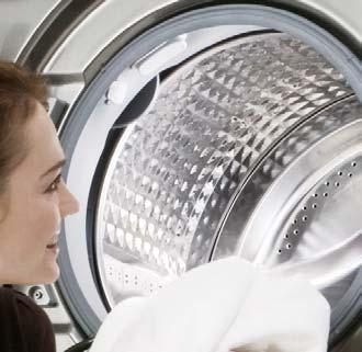 The door on the dryer is reversible to make loading and unloading easy.