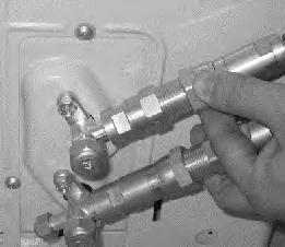 Align the refrigerant pipes correctly so that they line up with the valves and are not stressed.