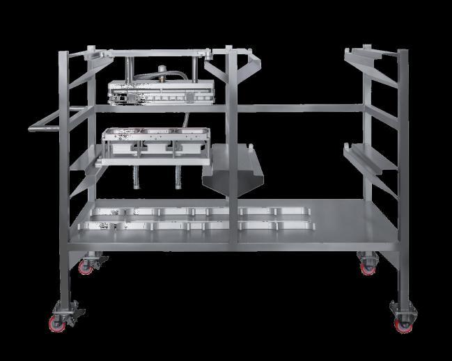 Extra Equipment Tool Trolley Positioned to the side of the tray sealer, assembled on wheels and locked in position, the bottom and top tool can be