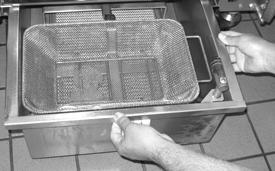 Prepare fryer for procedure. Check to make sure the fryer is cool. This procedure should be done only when the fryer is cool and the filter pan is empty. 2 Remove filter pan.