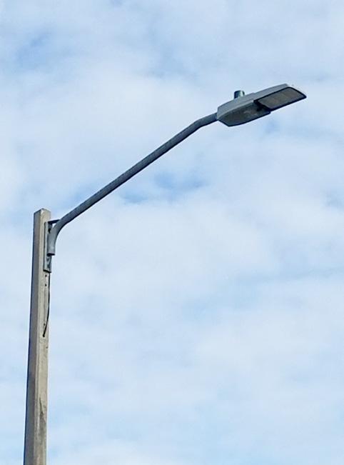 Adding new street lights to existing neighborhoods is possible, but requires agreement from the property owners who will be paying for them.